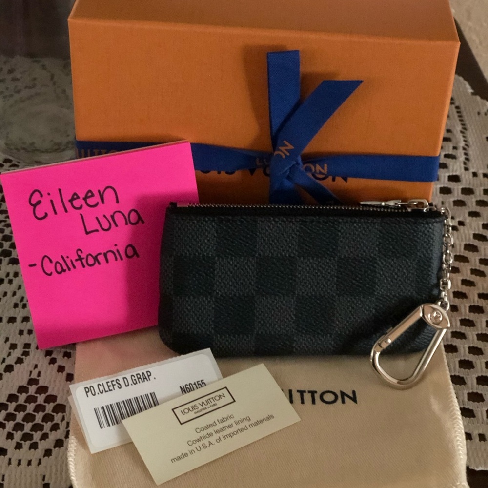 BNWT POCHETTE CLE